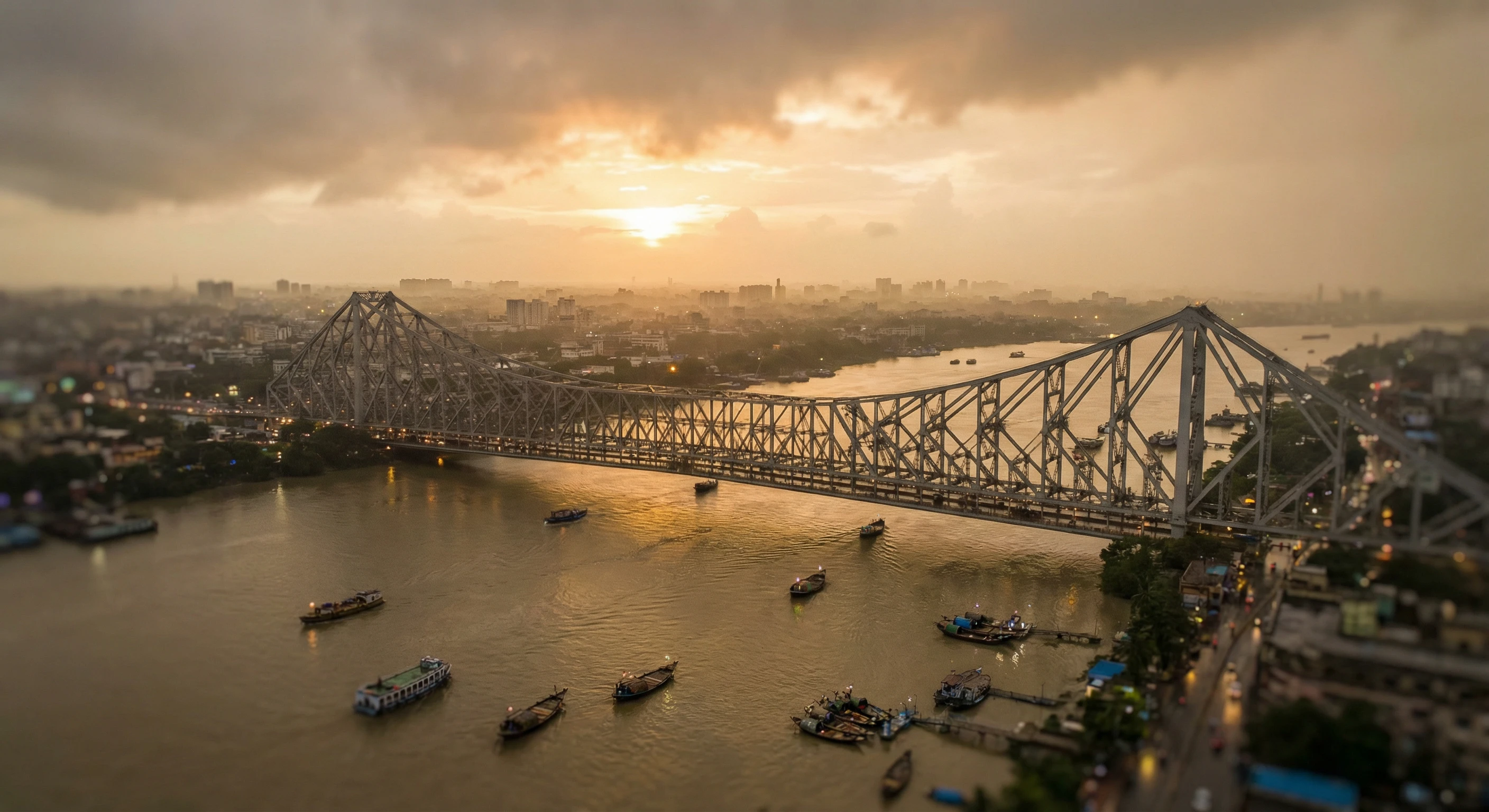 AI-generated aerial view of Howrah Bridge in Kolkata at dusk with muted naturalistic light, tilt-shift depth of field effect, generated by Nano Banana Pro